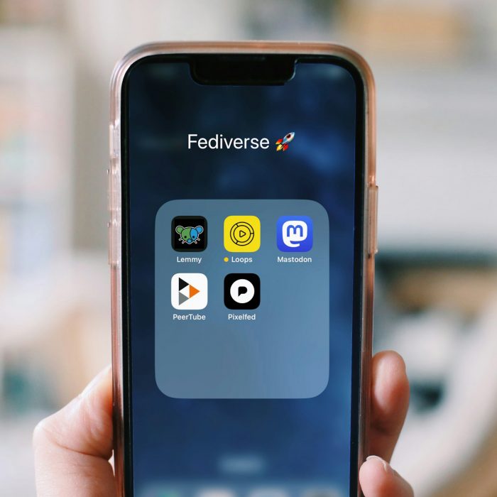 A phone displaying Fediverse apps